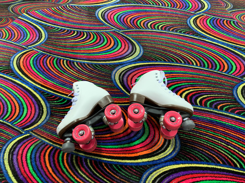 roller-skates-on-colorful-carpet-2022-01-21-20-58-09-utc_med